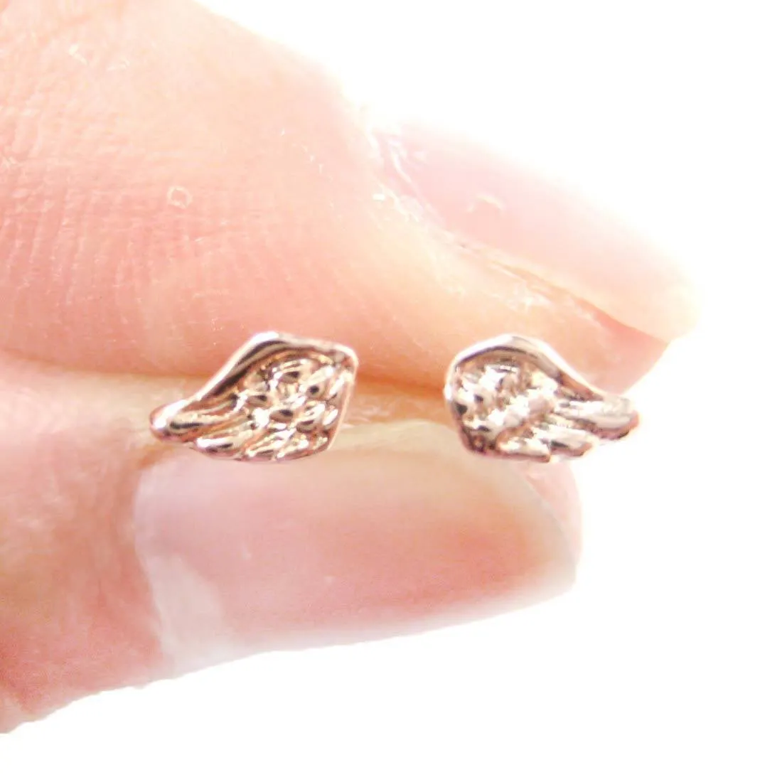 Tiny Angel Wings Feather Shaped Stud Earrings in Rose Gold | DOTOLY