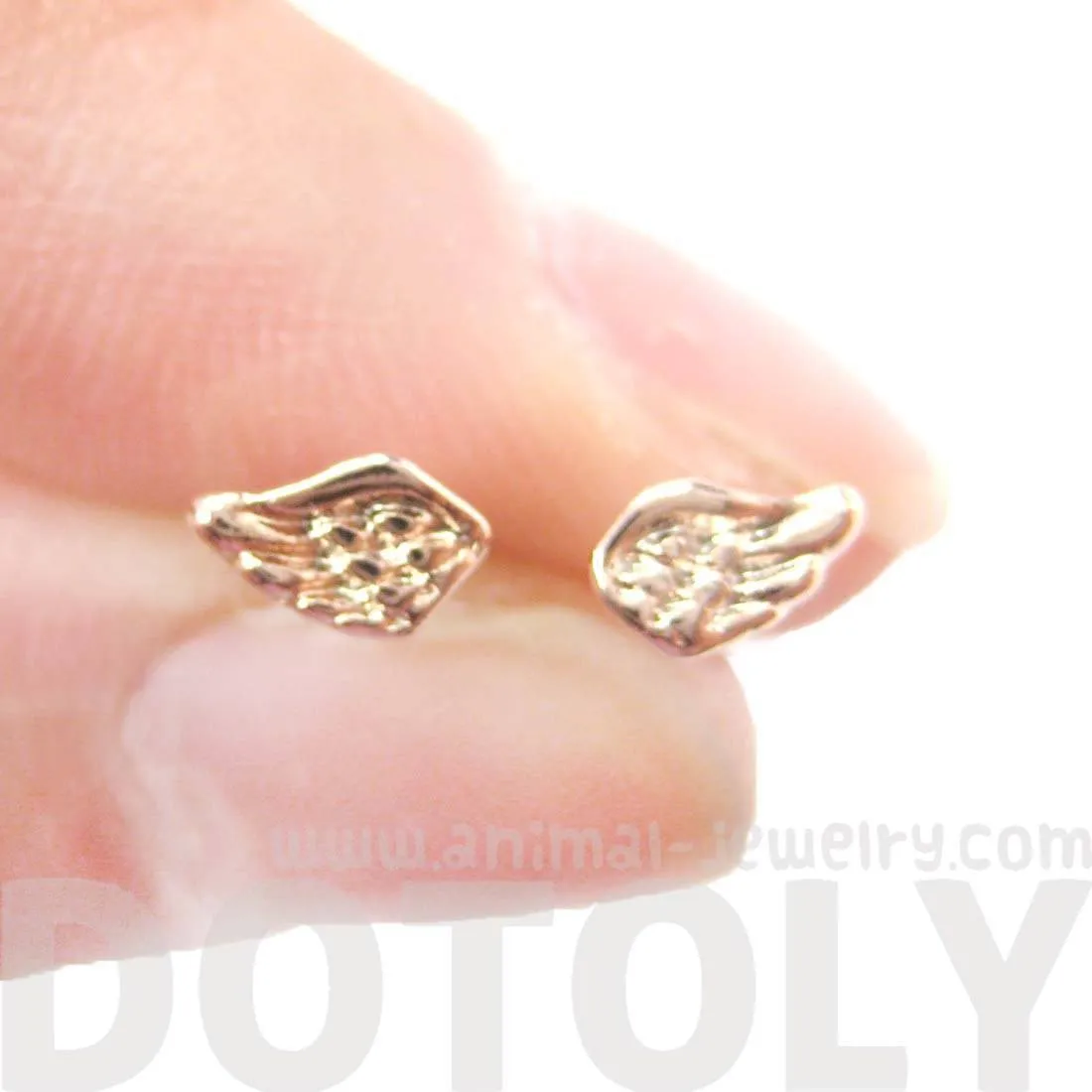 Tiny Angel Wings Feather Shaped Stud Earrings in Rose Gold | DOTOLY